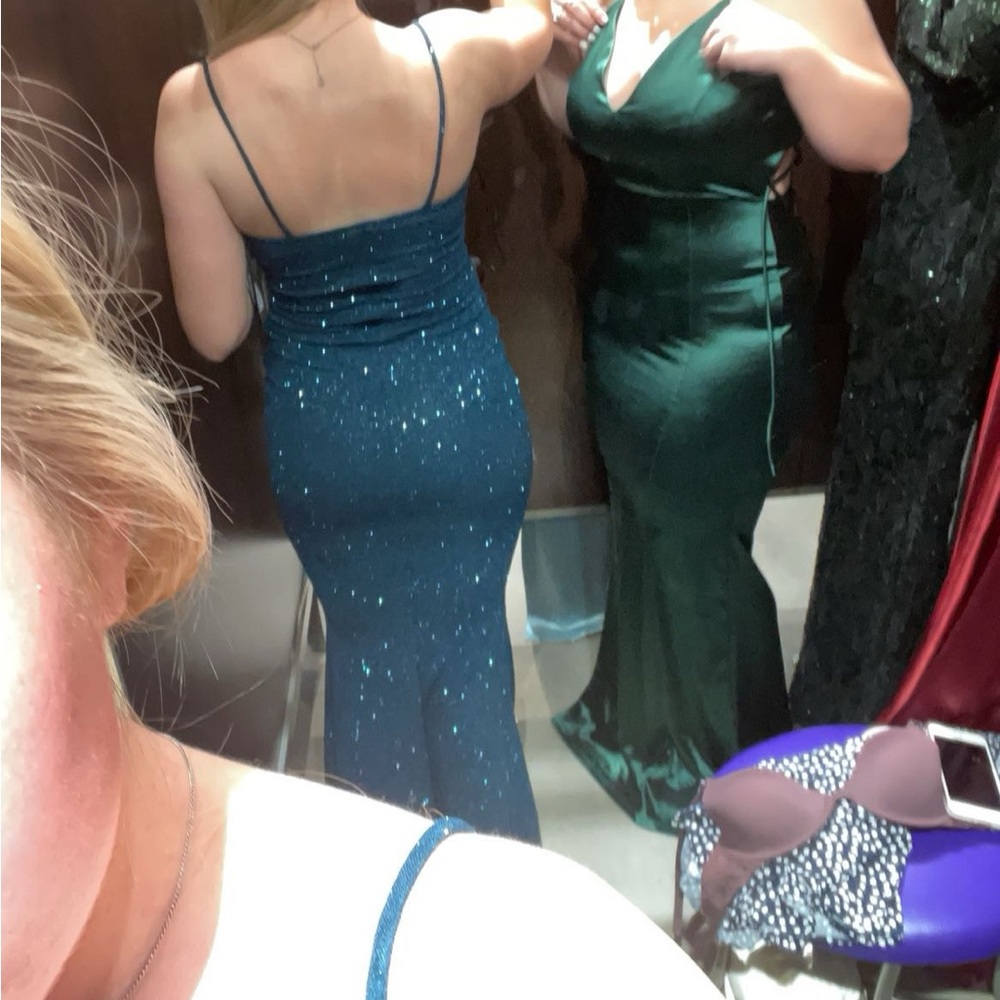 Glittery blue/green form fitting dress. Worn once!